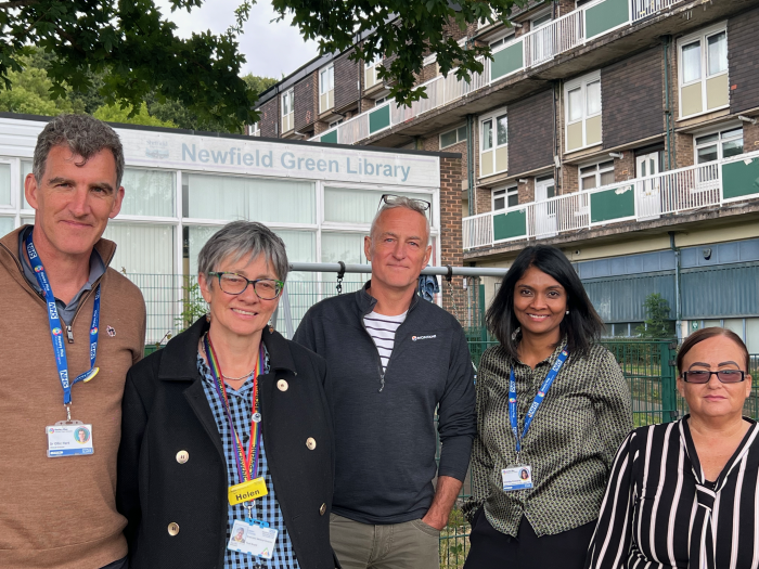 Team members behind the new 24 hour service in Heeley stand outside Newfield Green Library